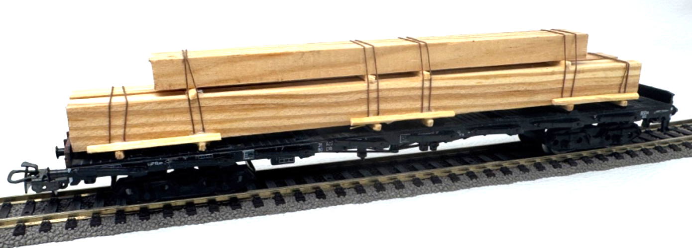 Märklin H0 4663 Flachwagen Rungenwagen (klappbar) mit Holzladung - H0 HO 1:87