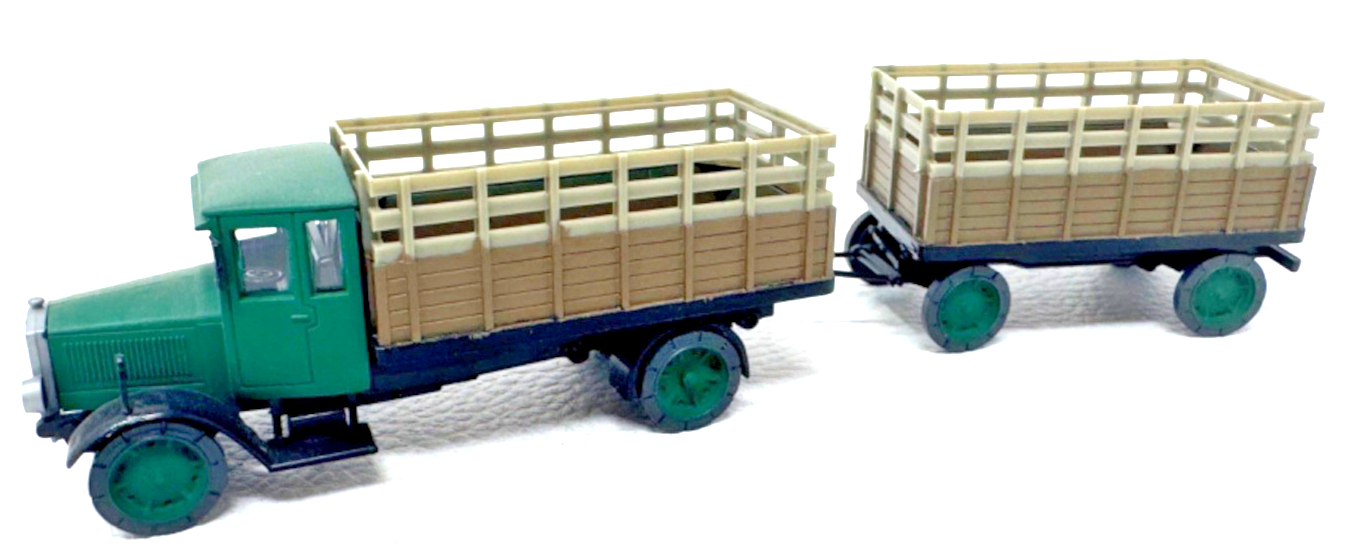 MAN Lastzug mit Holz / Gitteraufbau - grün / beige / grau - 1:87 H0 HO MAN Lastzug mit Holz / Gitteraufbau - grün / beige / grau - 1:87 H0 HO