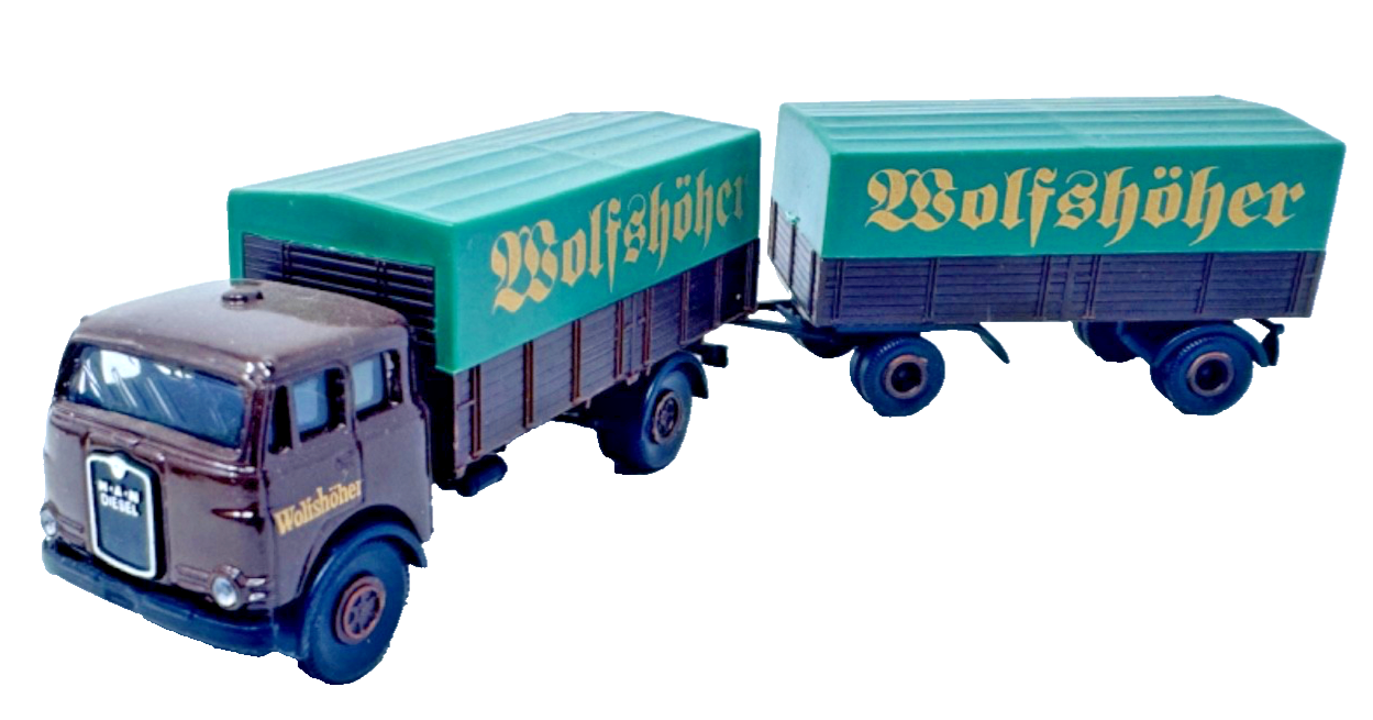Wörlein - MAN 10,212 Hängerzug Pritsche Plane Wolfshöher 1:87 H0 HO Wörlein - MAN 10,212 Hängerzug Pritsche Plane Wolfshöher 1:87 H0 HO