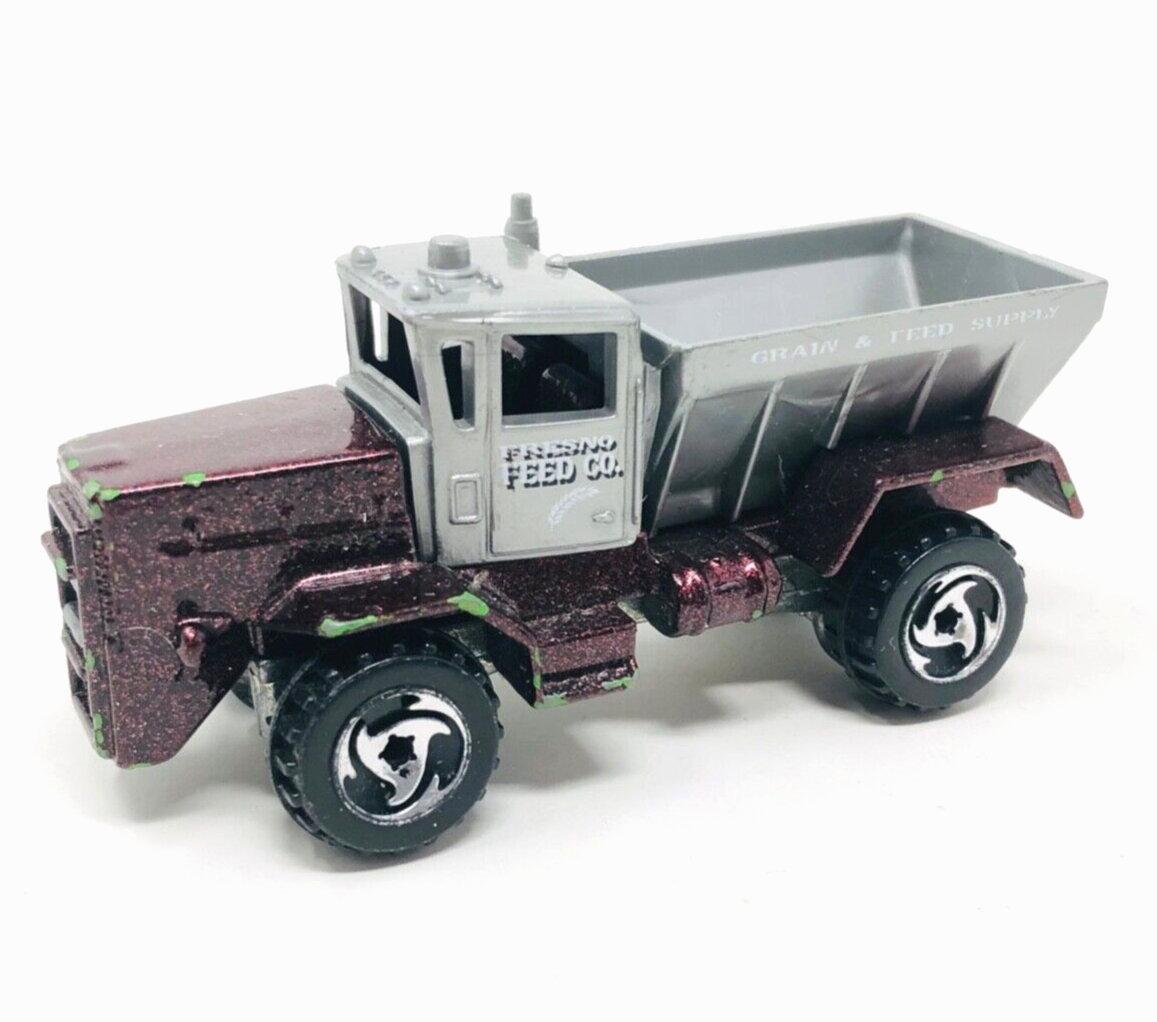 Vintage 1983 Hot Wheels Oshkosh Snow Plow Fresno Feed Co. - Purple Vintage 1983 Hot Wheels Oshkosh Snow Plow Fresno Feed Co. - Purple