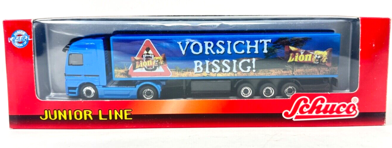 Schuco 22402 MB Actros Koffer Sattelzug "Lion Vorsicht Bissig! in OVP 1:87 H0 HO